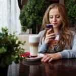 Portrait of Woman Photographing With Smart Phone